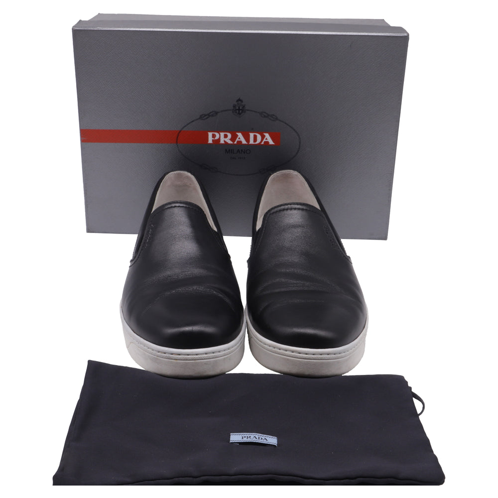 Prada Sport Slip-on Sneakers In Black Leather | ShopSimon