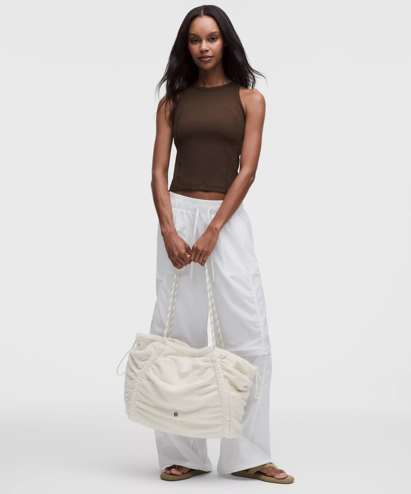 lululemon take it on tote bag 24l Ruched Color:Plum Apple Reflective Interior zippered and slip Tactical Advantage Product: Kelty
