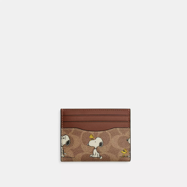 Coach Outlet Coach X Peanuts Slim Id Card Case In Signature Canvas