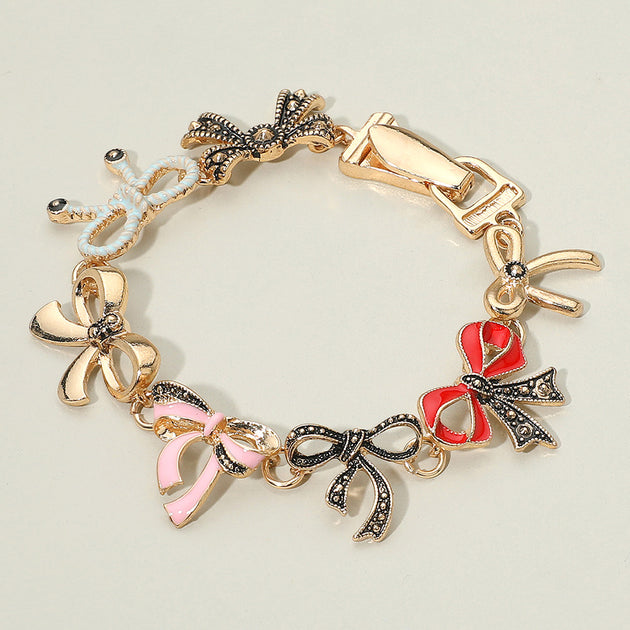 FASHNZFAB Vintage Bow Link Magnetic Bracelet Antique Gold Multi Red 2