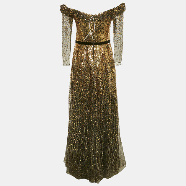 black and gold marchesa dress HERTROVE | Whitney Leavitt's Marchesa gown pairs a sculpted black bodice with layers of soft blush tulle, creating a look that feels striking yet...