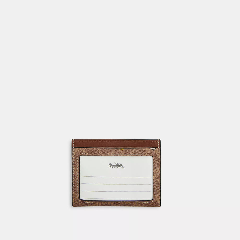 Coach Outlet Coach X Peanuts Slim Id Card Case In Signature Canvas