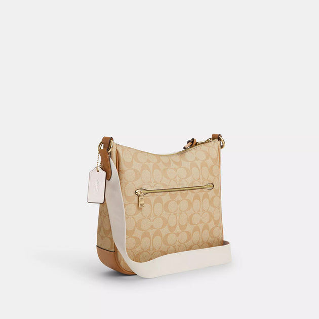Coach Outlet Ellie File Bag In Signature Canvas With Stripe ShopSimon