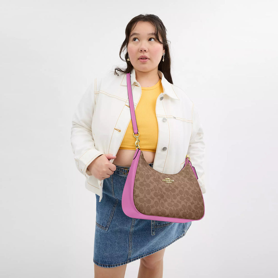 Coach Outlet Teri Hobo Bag In Signature Canvas | ShopSimon
