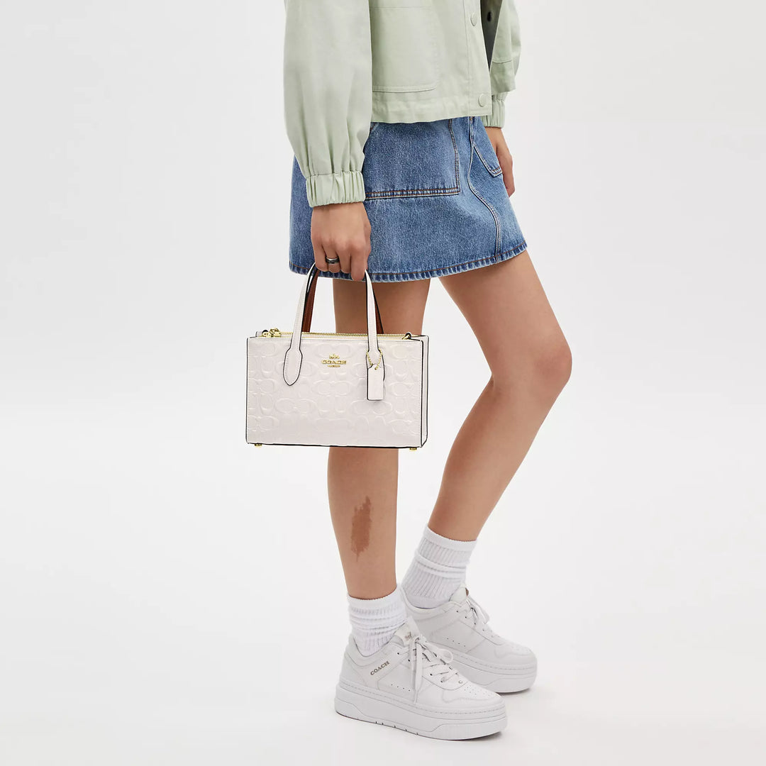 Coach Outlet Nina Small Tote Bag In Signature Leather | ShopSimon Coach Outlet Nina Small Tote Bag In Signature Leather | ShopSimon