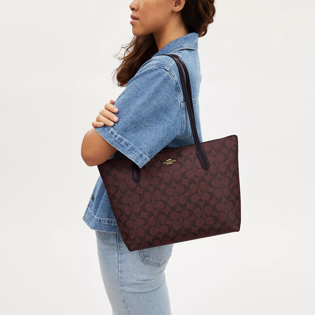 Coach Outlet Zip Top Tote In Signature Canvas | ShopSimon