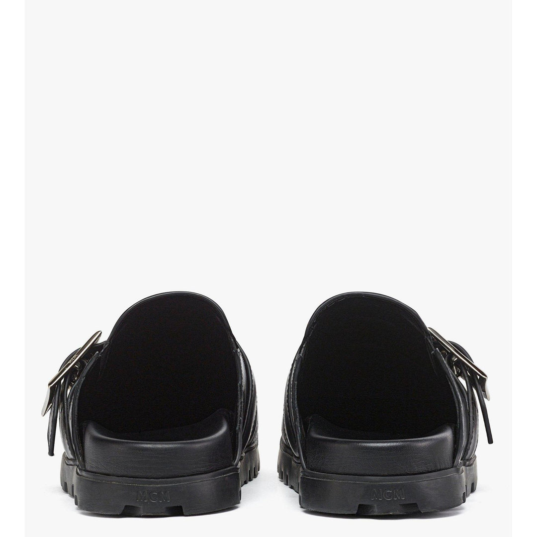 Mcm Flat Mule In Monogram Leather | ShopSimon display picture 1