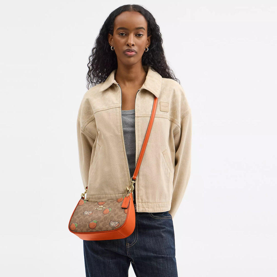 Coach Outlet Teri Shoulder Bag In Signature Canvas With Orange