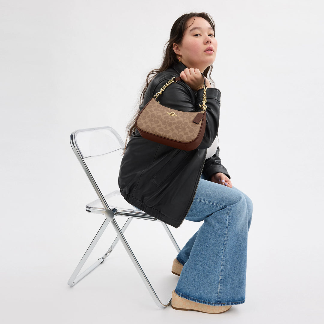 Coach Outlet Teri Shoulder Bag In Signature Canvas | ShopSimon