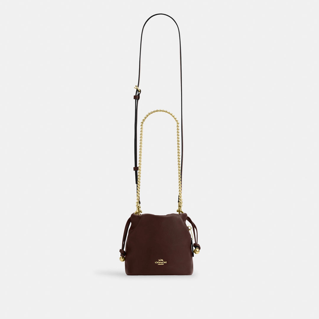 coach faye mini backpack Outlet Drawstring Bag With Ruching Fashion Fish Phone Charm The Faye Mini Drawstring Size:3 meters Material