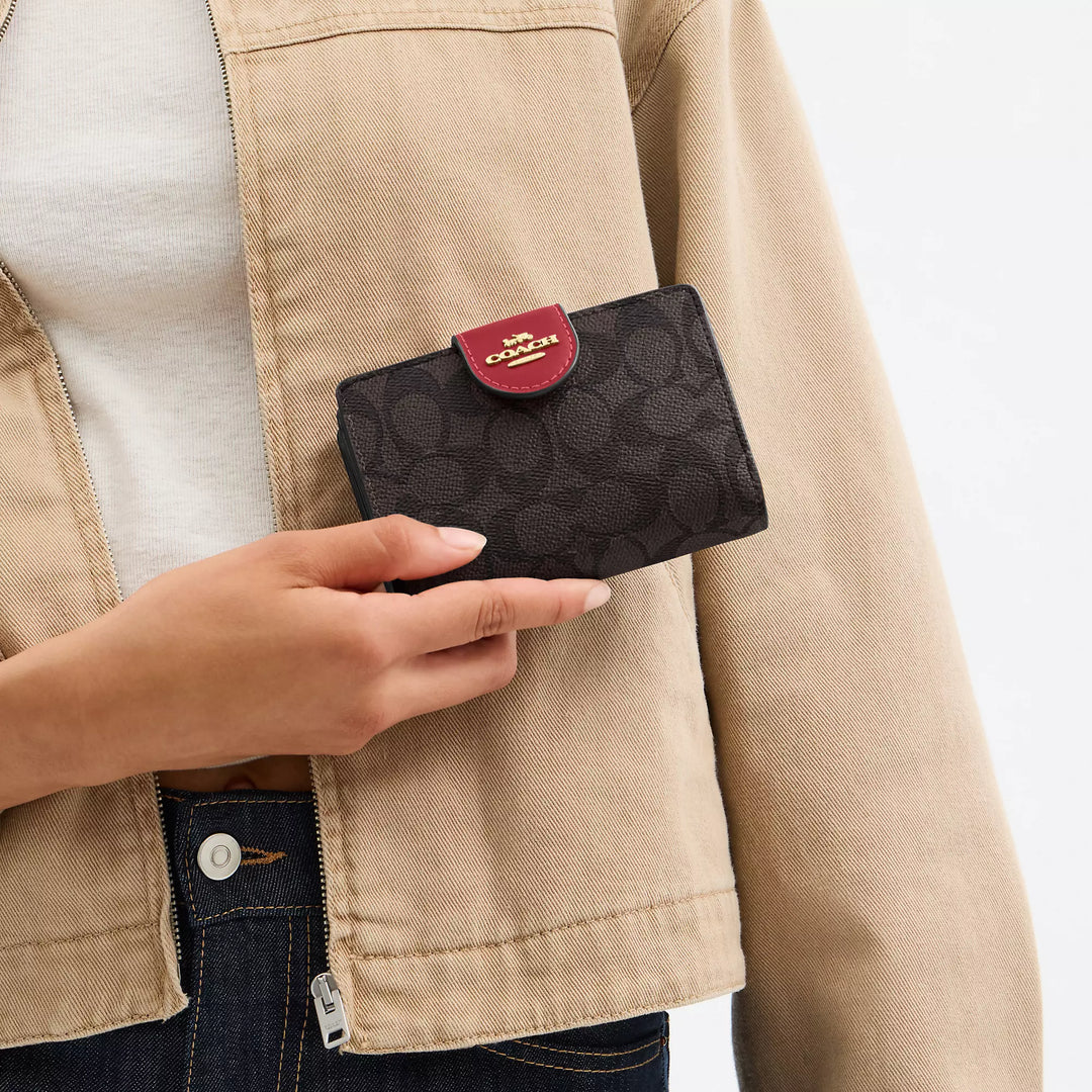 Coach Outlet Medium Corner Zip Wallet In Signature Canvas | ShopSimon