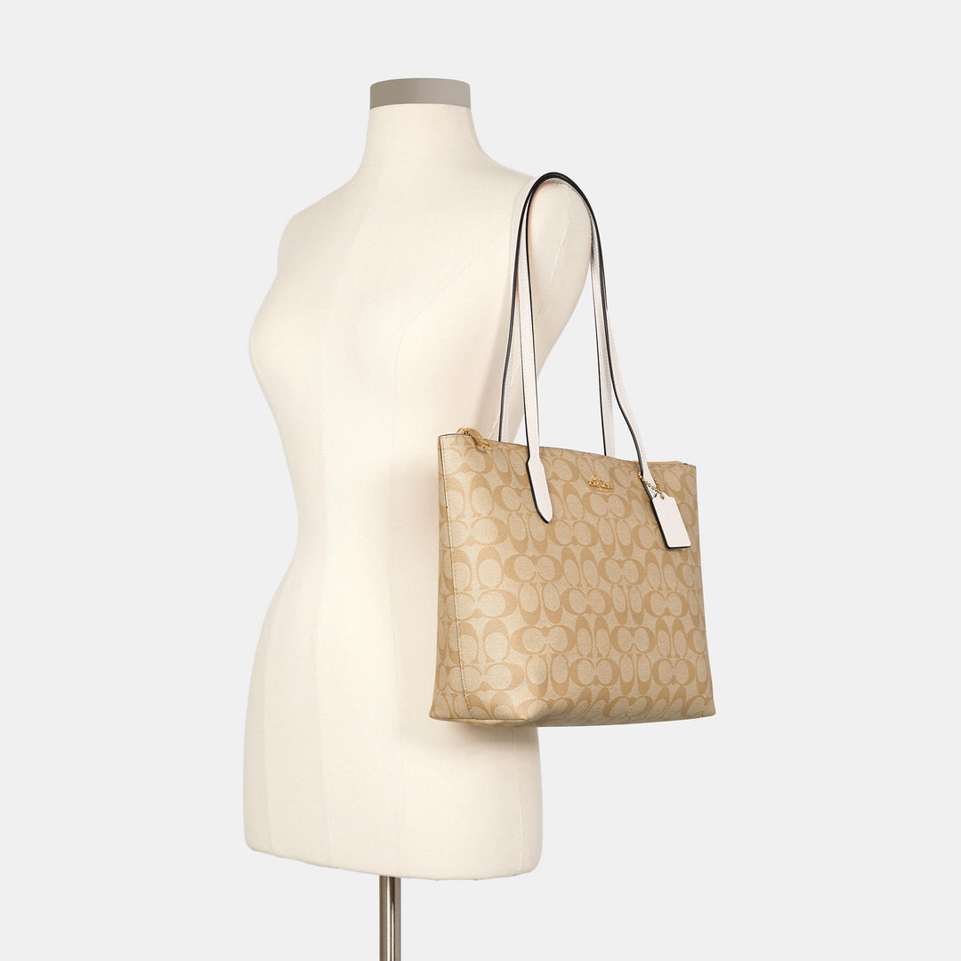 Coach Outlet Zip Top Tote In Signature Canvas | ShopSimon