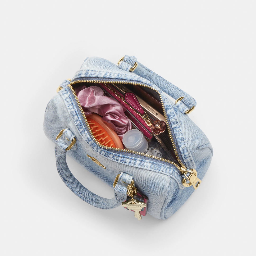 Coach Outlet Mini Rowan Crossbody Bag In Loved Denim With Charms