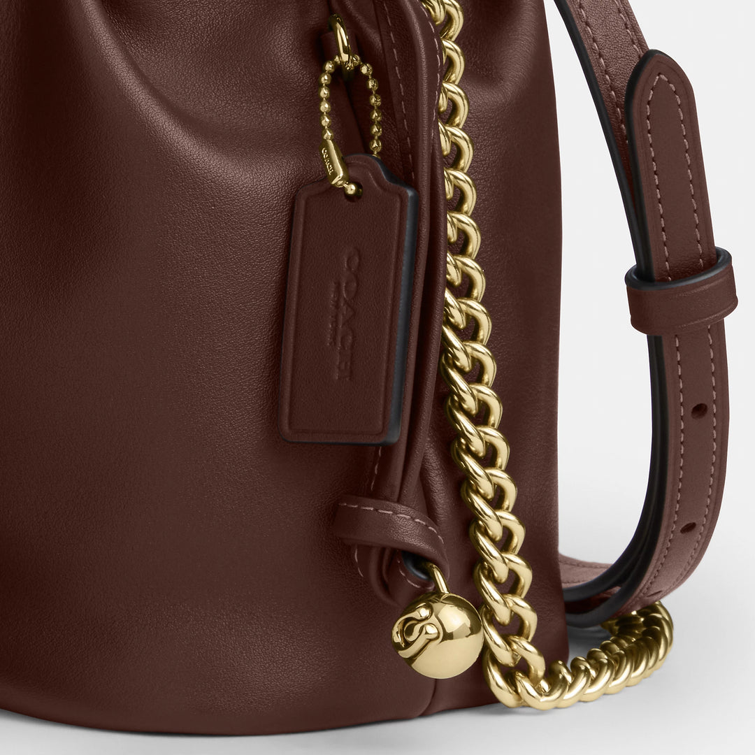 coach faye backpack oxblood Coach Outlet Faye Mini Drawstring Bag With Ruching