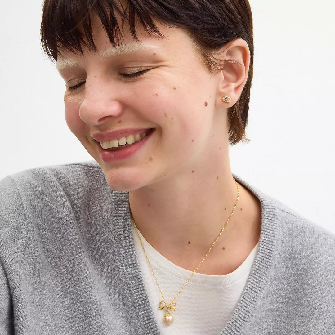 Coach Outlet Bow Pearl Necklace And Earrings Set | ShopSimon Coach Outlet Bow Pearl Necklace And Earrings Set | ShopSimon
