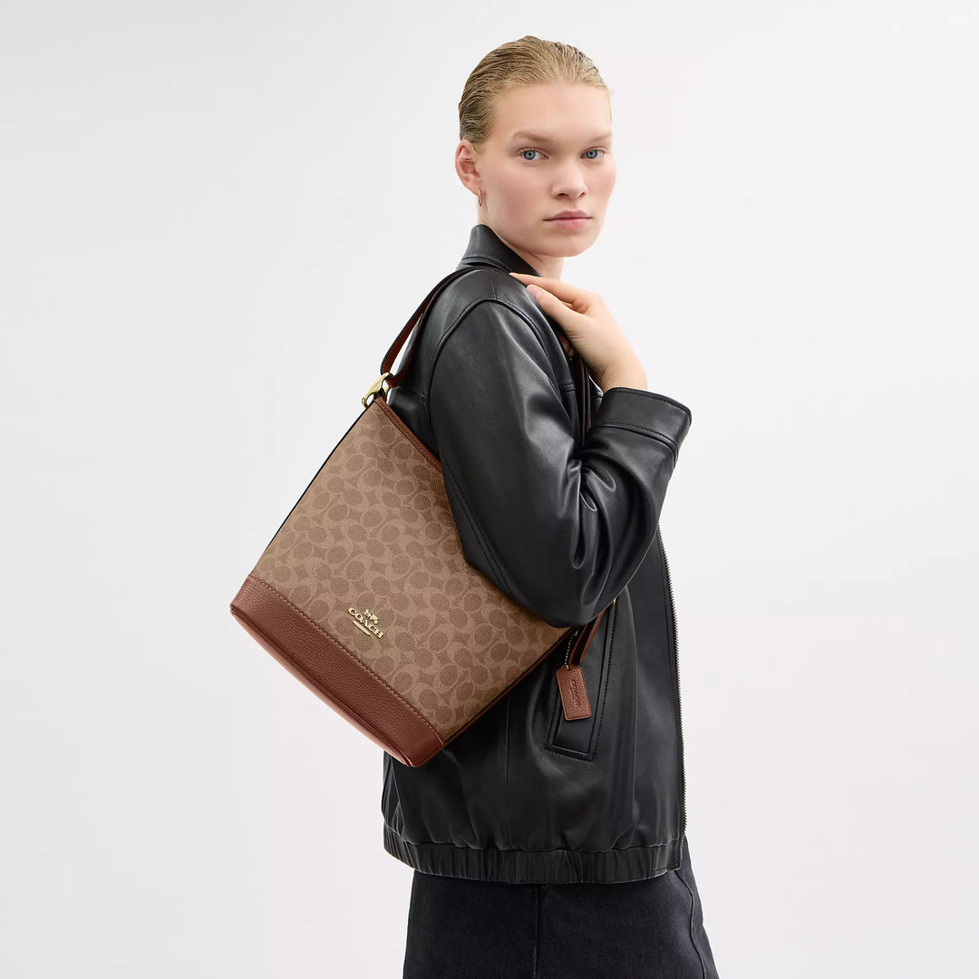 Coach Outlet Jude Bag In Signature Canvas | ShopSimon