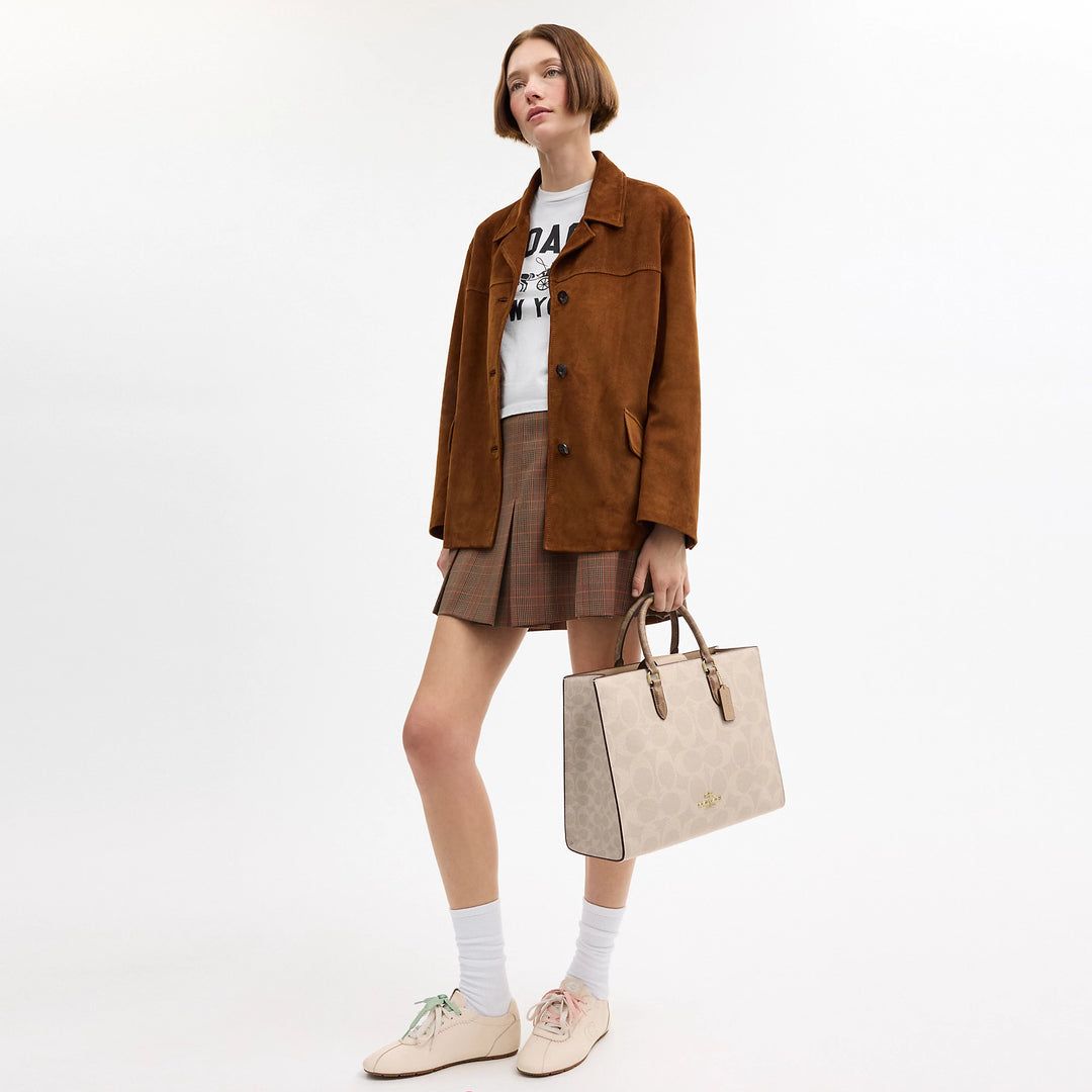 Coach Outlet Maggie Tote Bag In Blocked Signature Canvas | ShopSimon
