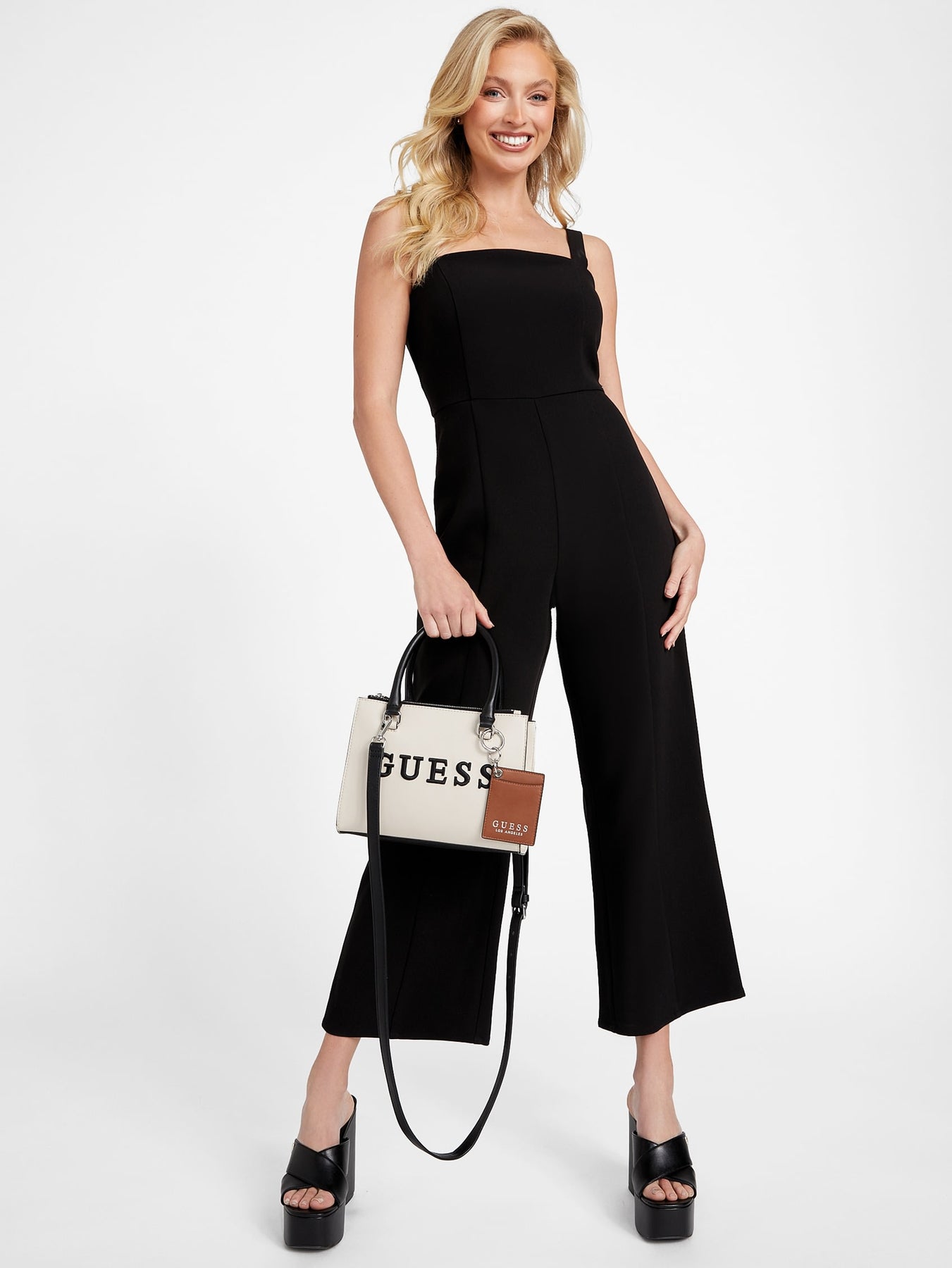 ●That Mobsta Guess Stasey Debossed Low-Top Sneakers | GUESS